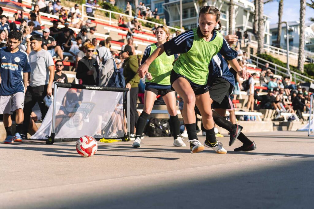 crowd of women playing football